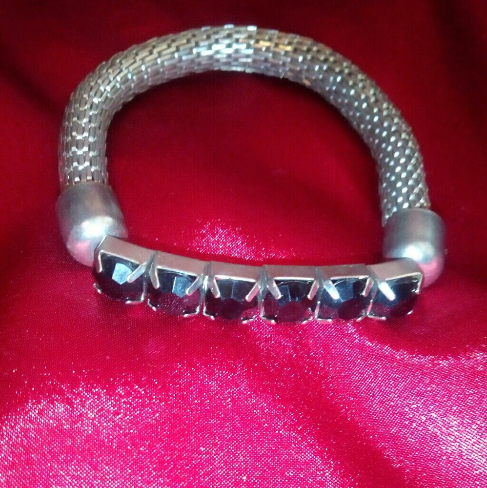 Black stone with silver band bracelet