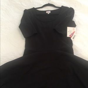 NWT, black embossed LuLaRoe Nicole dress.