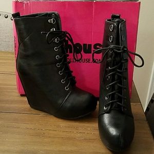 Black faux leather wedge boots