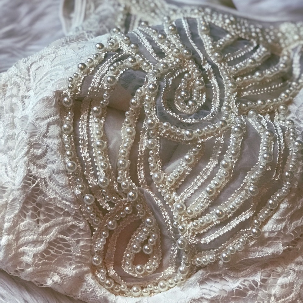 Embellished white one piece