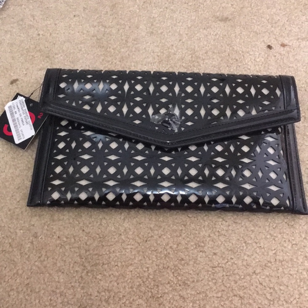 Sondra Roberts black patent clutch laser cut sr2