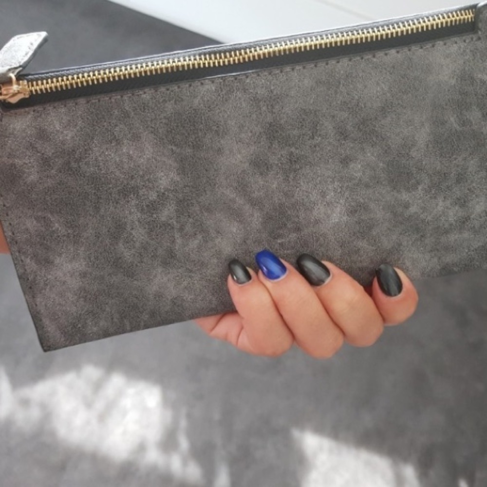 Brand new grey clutch purse or wallet.