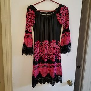 Black and pink dress with lace on bottom and sleev