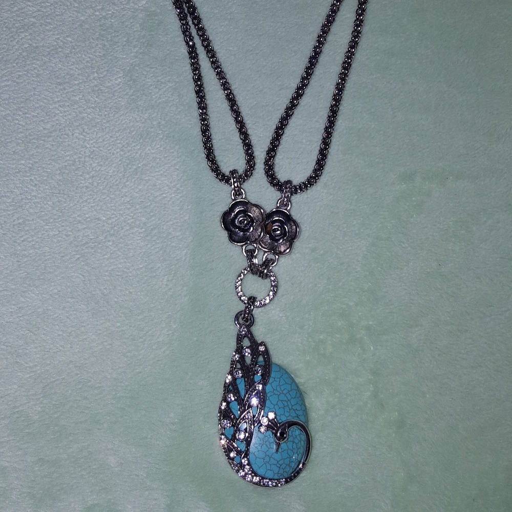 Silver and teal peacock pendant necklace