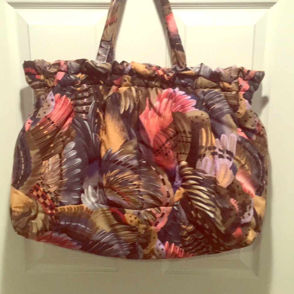 Large floral print overnight bag.