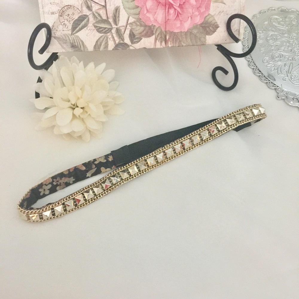 Faux gold studded elastic headband.