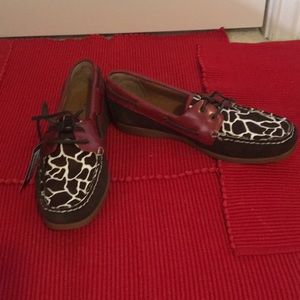 Red, brown and cow print loafers