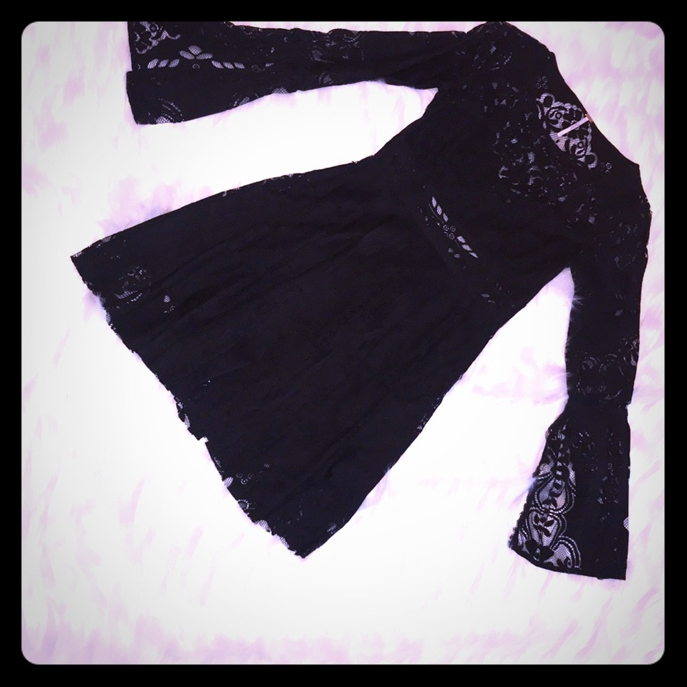 Never worn, black, bell sleeve Free People tunic