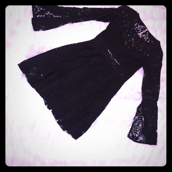 Free People Dresses & Skirts - Never worn, black, bell sleeve Free People tunic Free People Dresses & Skirts - Never worn, black, bell sleeve Free People tunic