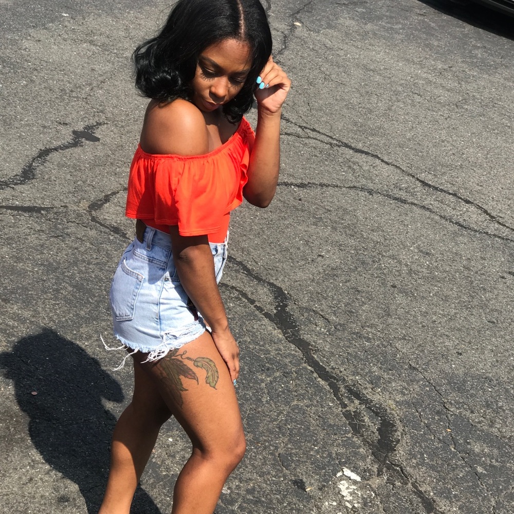orange body suit