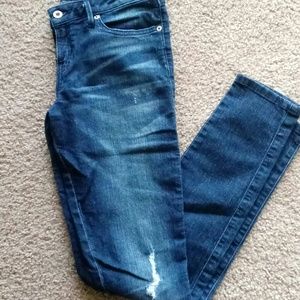 Distressed Guess Skinny Jeans