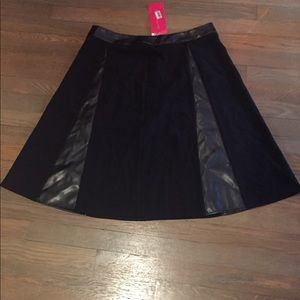 Sunny Leigh- black faux leather skirt