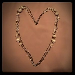 Long faux pearl necklace