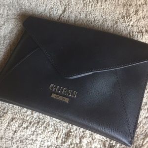 Black mini bag by Guess