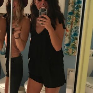 Cute black romper with bow ties