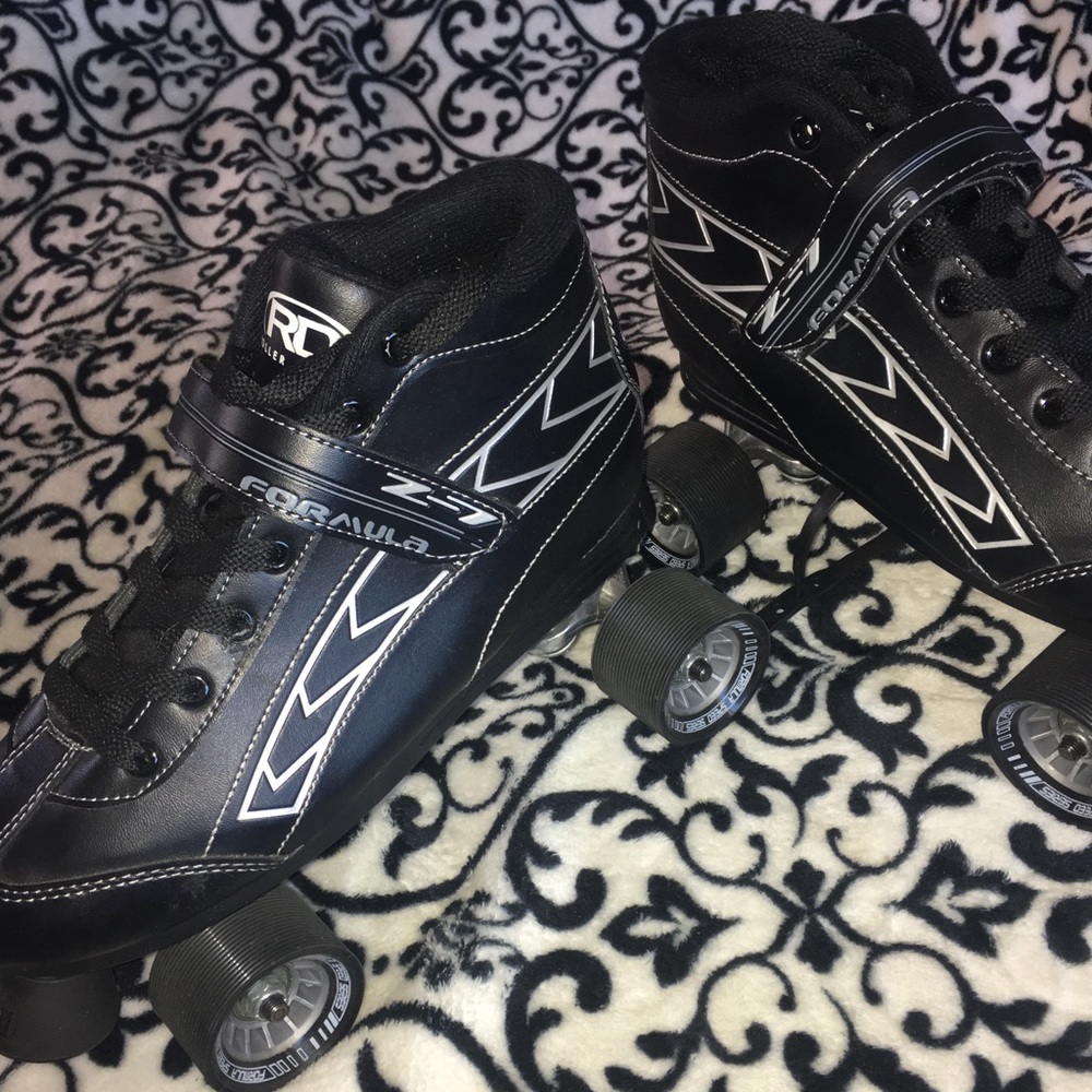 Practically NEW 4 wheel Skates