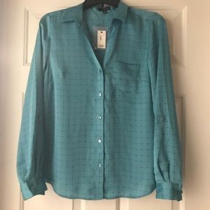 The limited, teal green button up blouse
