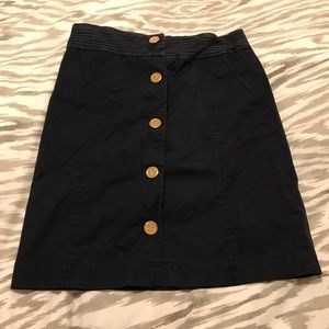 Tory Burch navy blue skirt with gold “T” buttons