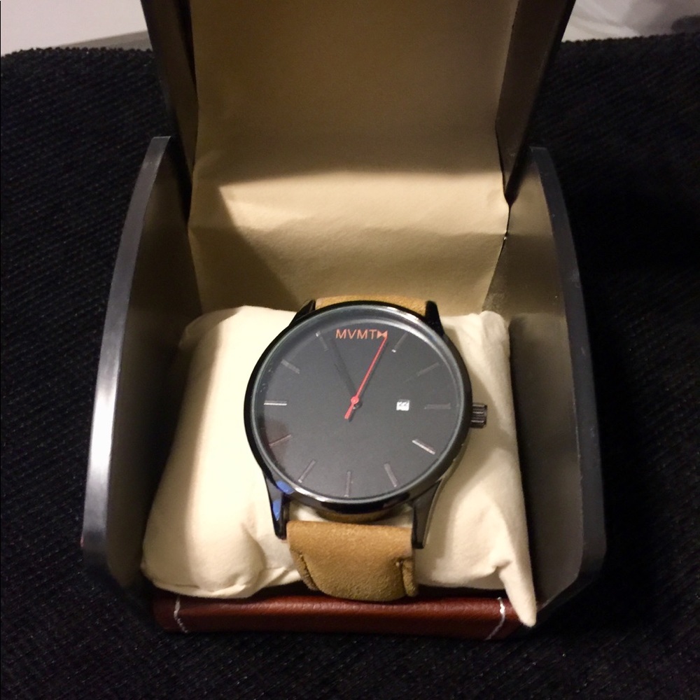 New watch with hard storage case.  Last one