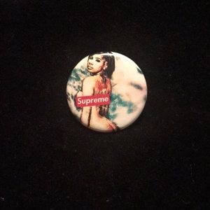 Supreme pinback button