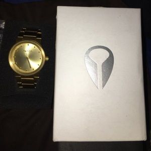 Nixon gold watch
