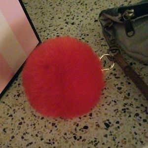 Red poof ball