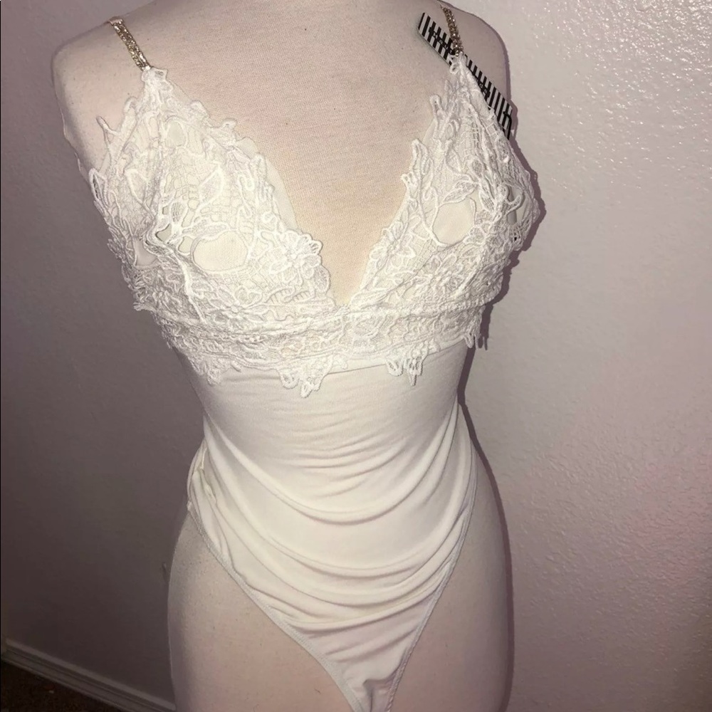 Brand new white bodysuit