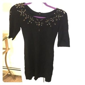 Black mini dress, bedazzled neckline, open back