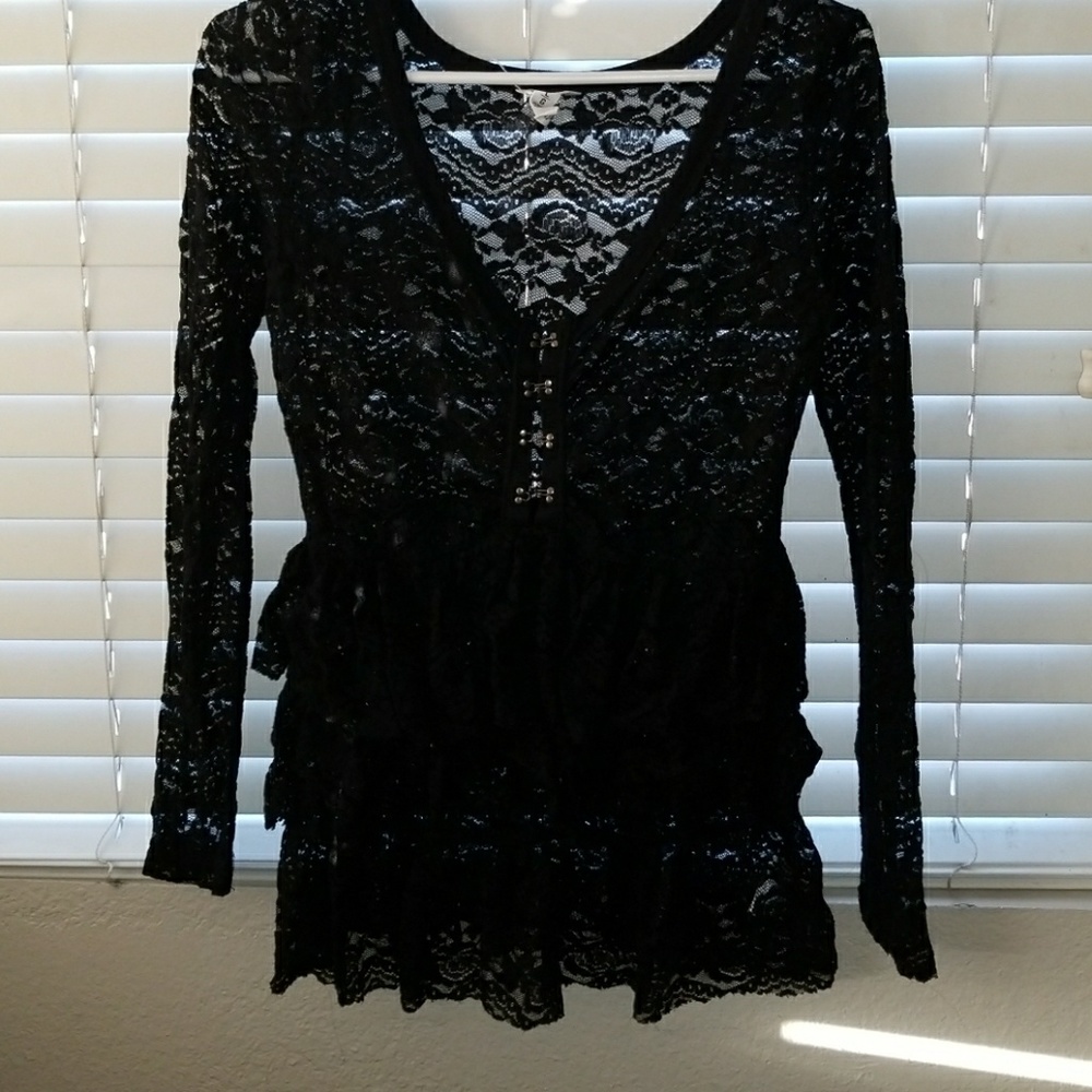 A mesh/Lace long sleeve shirt