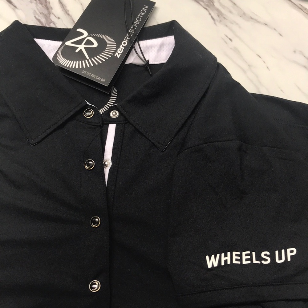 Zero restrictions golf polo wheels up