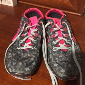 Pink cheetah Nike Free shoes