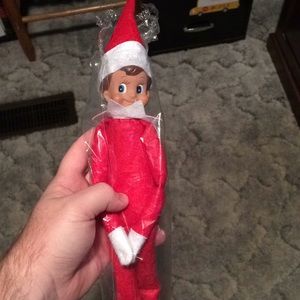 Blue eyed boy elf on the shelf.
