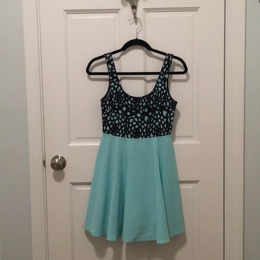Turquoise and black dress