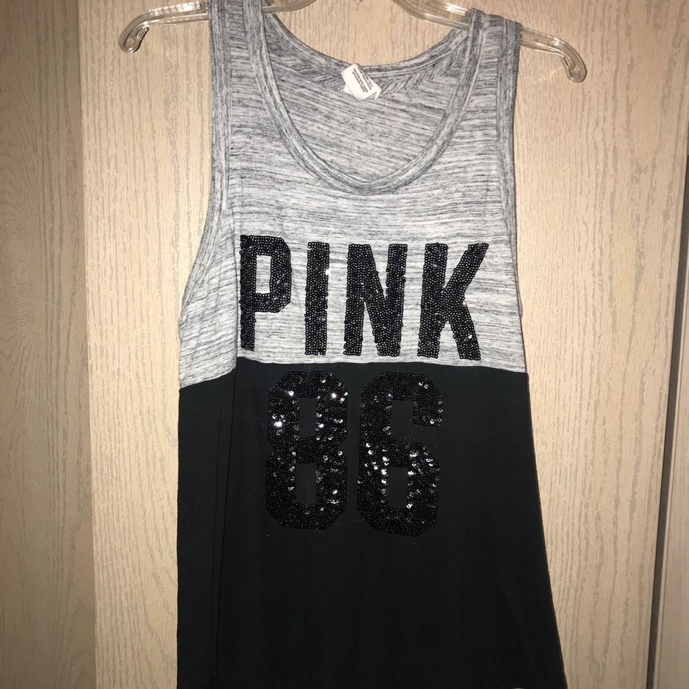 Victoria decree PINK tank tops!