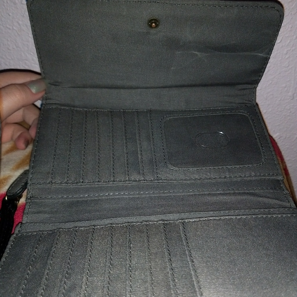 Wallet with wrist attachment