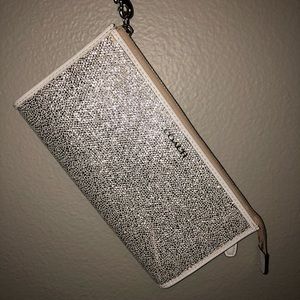 Sparkling Silver Coach Wristlet