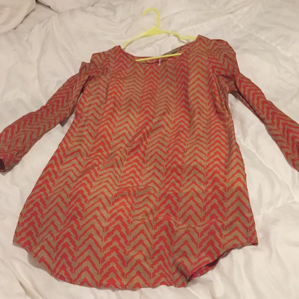 Boutique tan and burnt orange chevron style dress