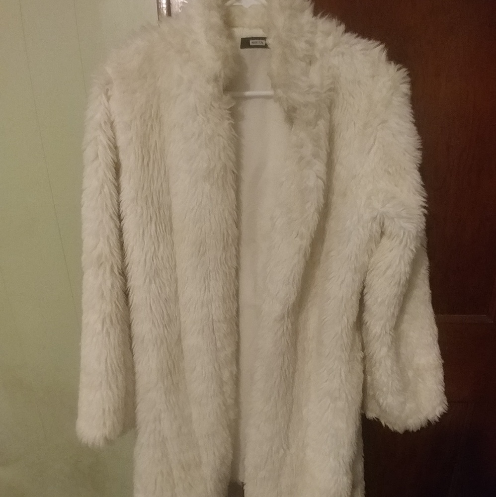White furry jacket