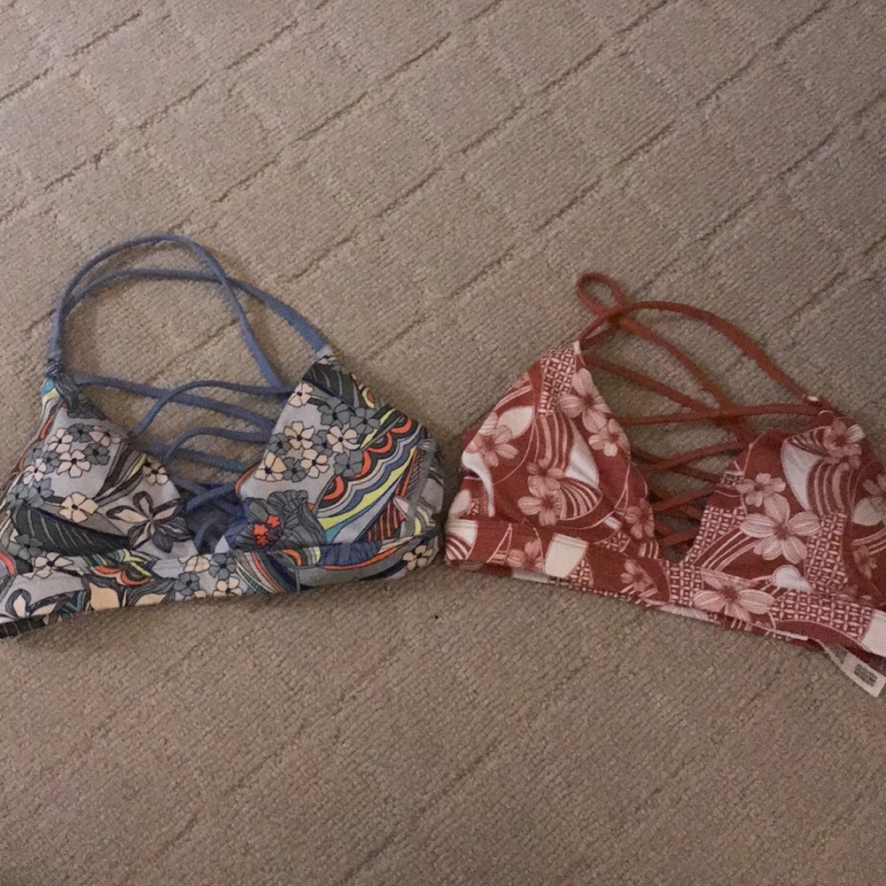 Two Victoria Secret Sports bras