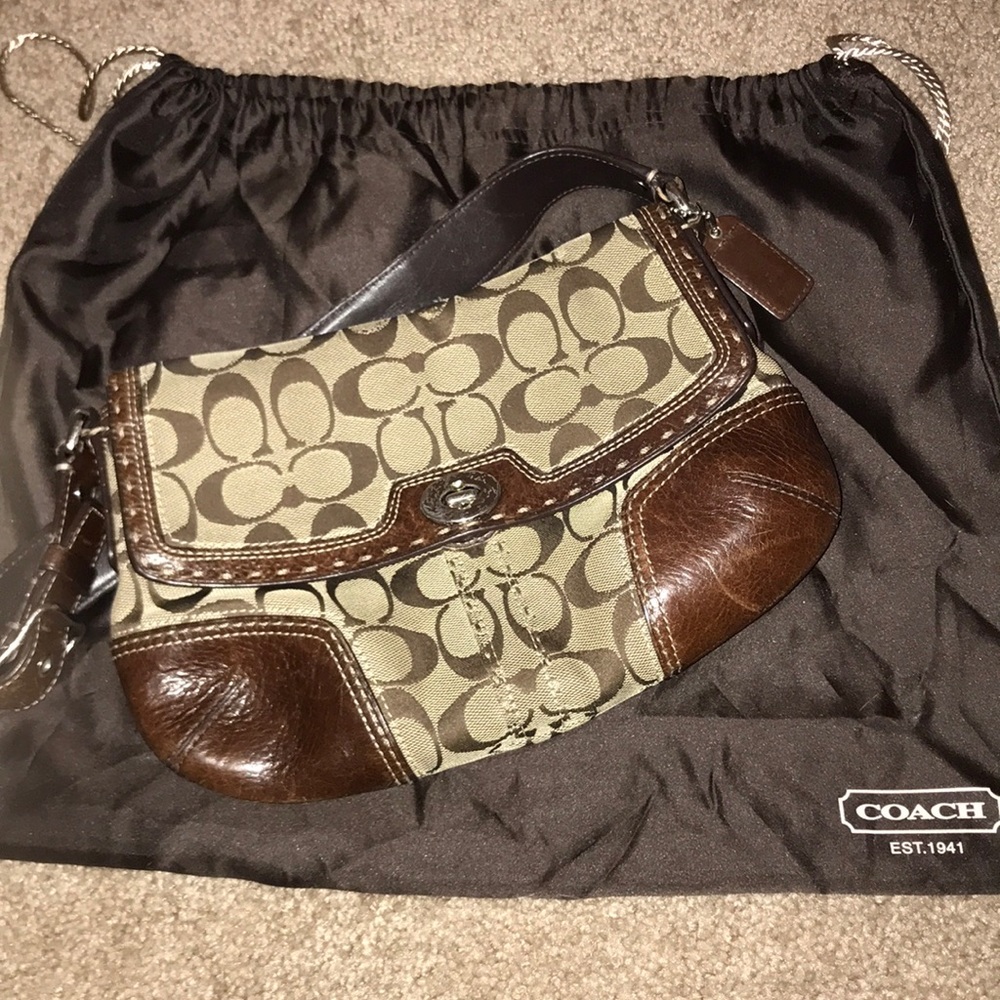 Brown canvas w/ leather strap & accents Coach bag