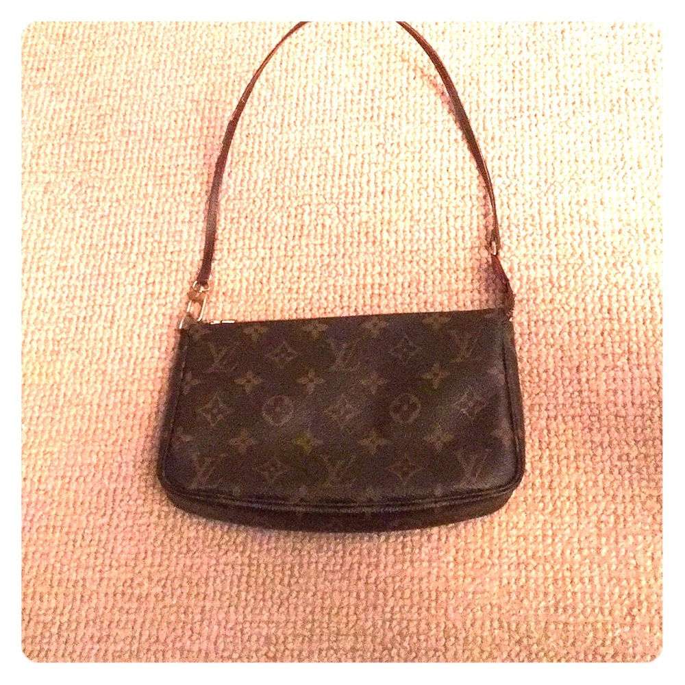 Louis Vuitton pochette bag with shoulder strap.