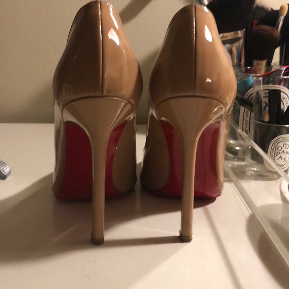 Nude patent leather louboutin pumps