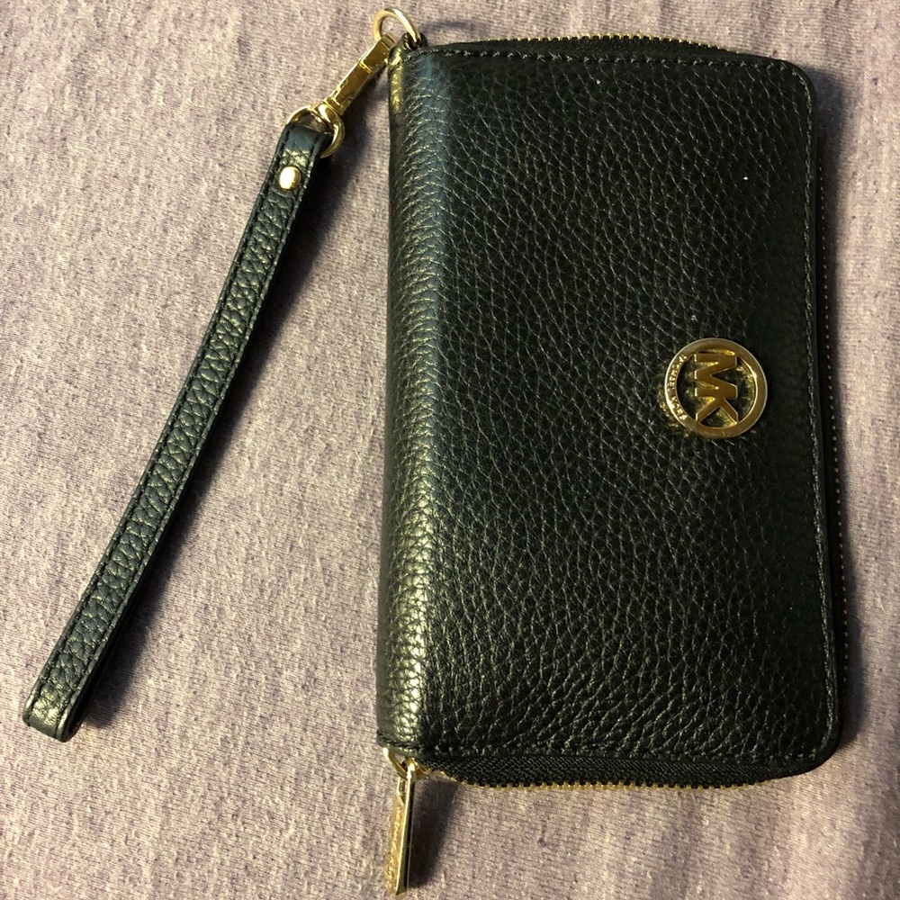 Michael Kors woman’s wallet.