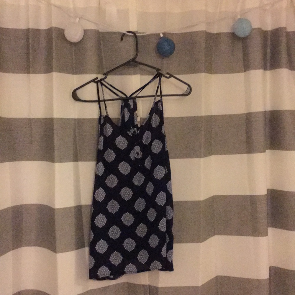 Cute, strappy, navy top!