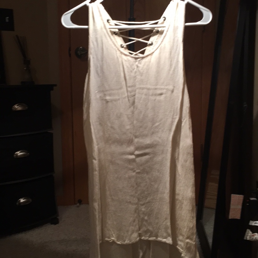 Adorable cream tank top with back tie detail