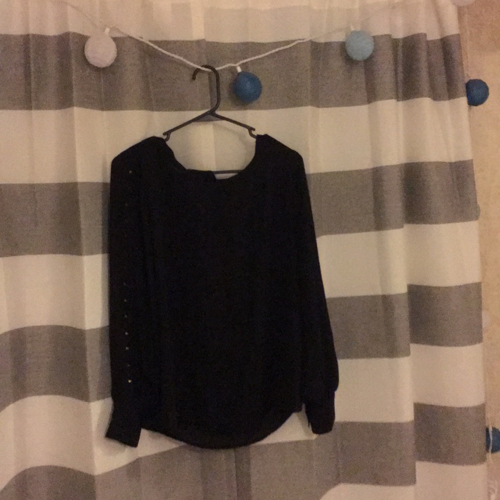 Black polyester top with gold spikes down sleeves!