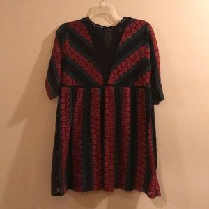 Lacey sleeved dress with mesh plunging neckline