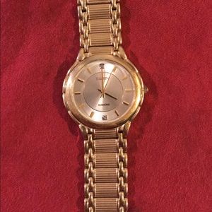 Men’s gold Elgin dress watch