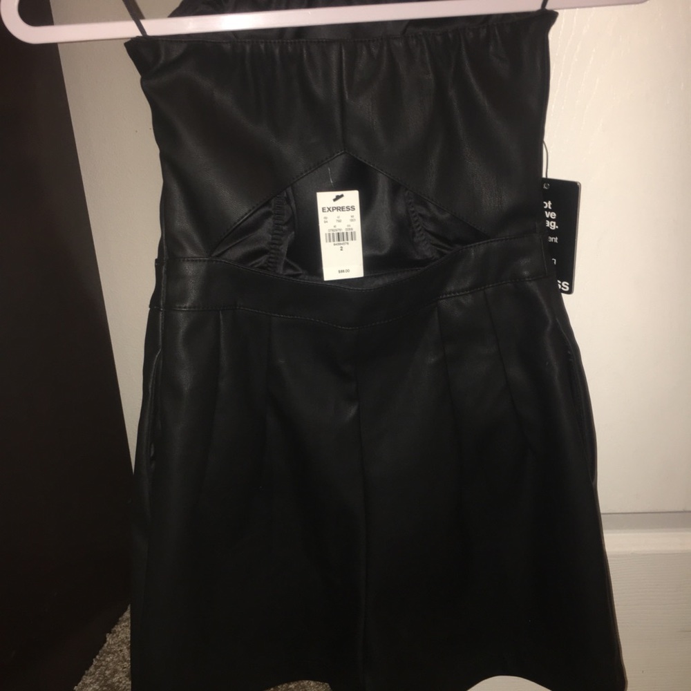 Leather romper with pockets. Brand New.