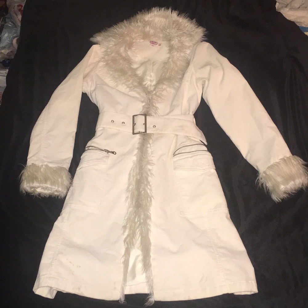 Long white corduroy coat with faux fur collar.